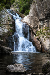 Fototapeta na wymiar Waterfall Mokranjske Stene in village mokranje near the Negotin, in Serbia