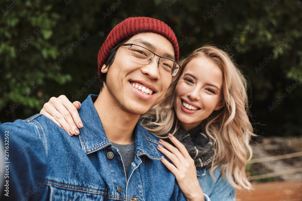 Sticker Happy young multhiethnic couple spending time