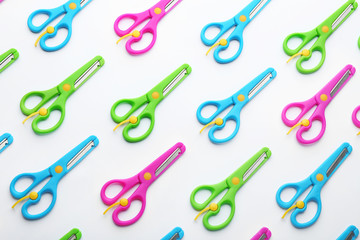 Set of training scissors on white background, top view