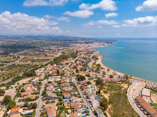 Fototapeta premium The coastline of L'Ampolla, Catalonia, Spain. Drone aerial panorama
