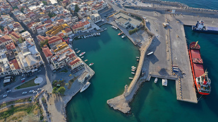 Aerial drone photo of unique old picturesque Venetian port with old lighthouse in the heart of famous city of Rethymno, Crete island, Greece