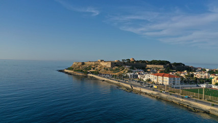 Fototapeta na wymiar Aerial drone photo of unique old picturesque Venetian port with old lighthouse in the heart of famous city of Rethymno, Crete island, Greece