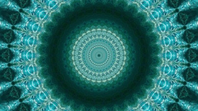 Hypnotic kaleidoscopic zoom cool green blue relaxing colors.mov