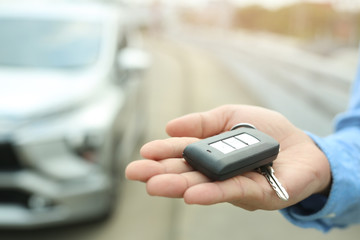 Car keys in the hands of businessmen