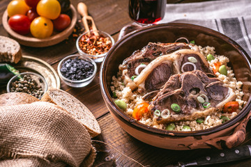 Roasted Lamb Loin Chops with Soybean and Couscous in Rustic Dish