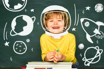 Happy schoolkid or preschooler learn. Back to school and happy time. Kids school.