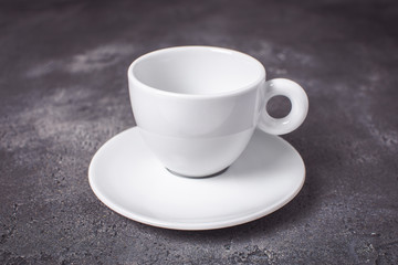 Empty White Espresso Coffee Cup on Dark Background