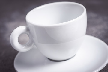 Empty White Espresso Coffee Cup on Dark Background