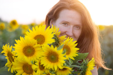Girl and sunflowers