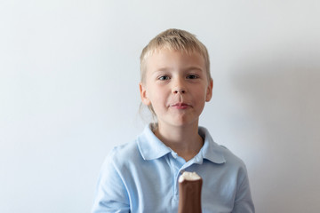 little boy eating ice cream