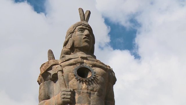 Close-up low angle  still shot of statue of Pachacutec portrait above Cusco, Cusco, Peru
