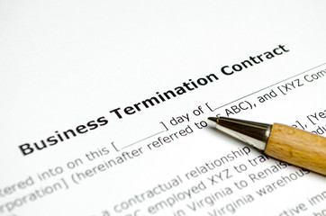 Bussines termination contract with wooden pen