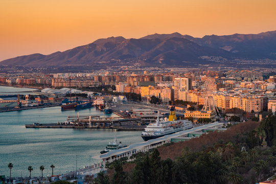 Spain, Malaga, view over the harbor by sunrise
