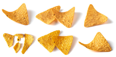 Tasty crispy potato chips isolated on white background