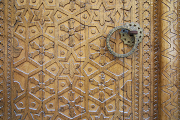 Detail from an elaborated door in Bukhara, Uzbelistan