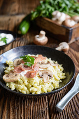 Zucchini dumplings with roasted mushrooms, Prosciutto, cheese and sour cream