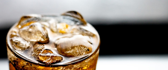 glass of cola with ice