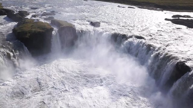 Tilt down aerial, Godafoss waterfall in Iceland