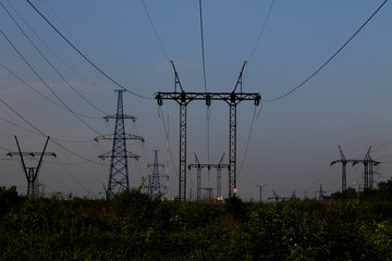 High voltage power line against the sky