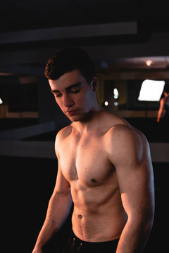 young fitness man posing