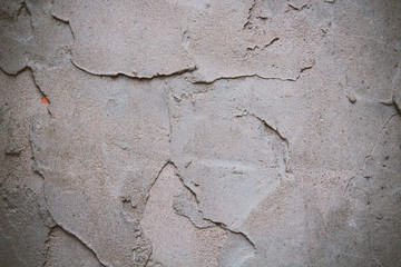 Old plaster on the wall. Close-up. Background. Texture.