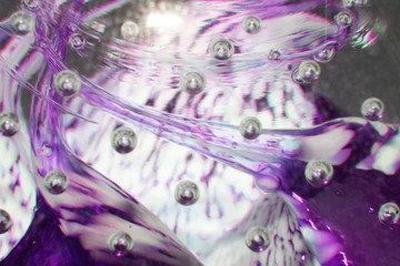Macro Close Up of Inside a Paperweight Bubbles Pink Purple Glass