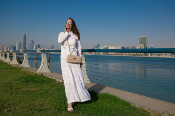 UAE. Woman in quay Abu Dhabi