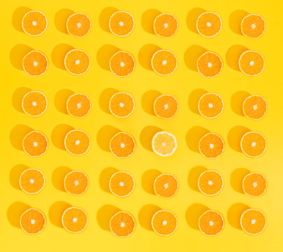Set of beautiful wallpaper with sliced oranges on bright yellow background.