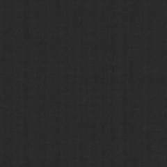 The hard surface of the wall is gray with a rough surface