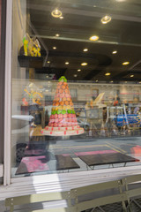 The pyramid of macaroon cakes in a candy store