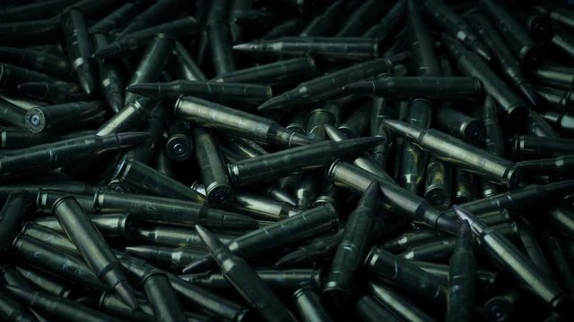 AK47 Bullets Rotating In Pile