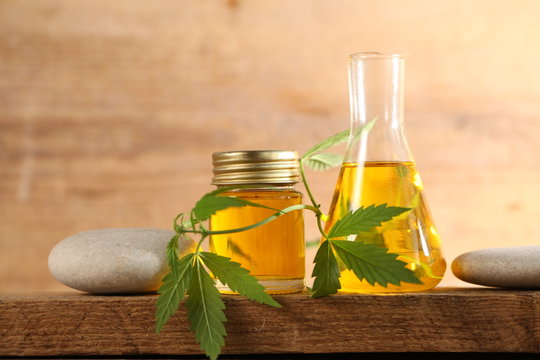 Cbd Oil Bottle And Hemp Leaf . Medical Cannabis