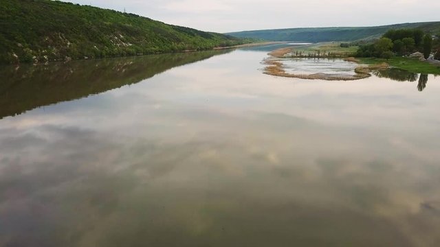 Flight over the river aat spring time. Dniester river of Moldova republic.