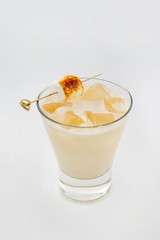 Closeup glass of white russian cocktail drink isolated at white background.