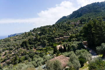 Fototapeta na wymiar Beautiful view of the old mediterranean mountain village Deia, Spain Majorca, Balearic Islands.