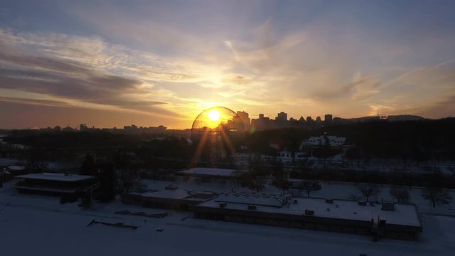 Sun sets over Biosphere Environmental Museum, aerial