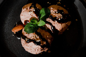 Set of ice cream scoops of different colors and flavours with berries, nuts and fruits
