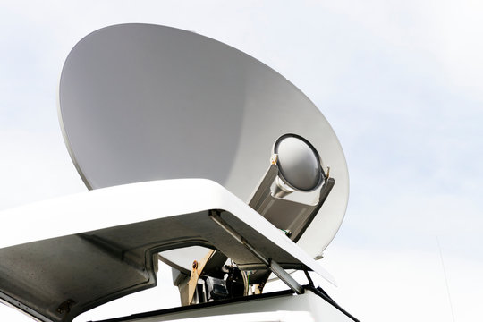 satellite parabolic antenna dish in van for news
