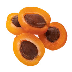 heap of halves of apricots isolated on white background