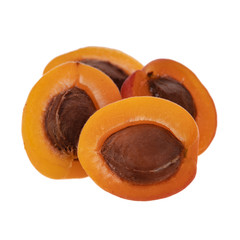 heap of halves of apricots isolated on white background
