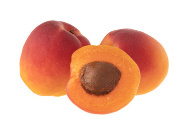 heap of red apricots isolated on white