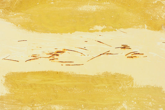 Close up of yellow paint and rusty scratch marks,Close up of yellow paint and rusty scratch marks