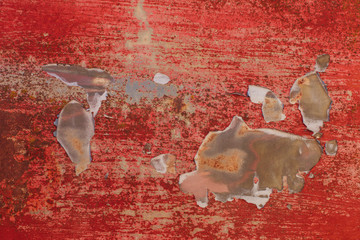 Detail of rusty metal and peeling pant,Detail of peeling red paint and rusty metal
