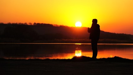 silhouette of man in the sunset