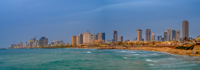 Fototapeta na wymiar Panoramic sunset view of of Tel Aviv coastline, Israel.