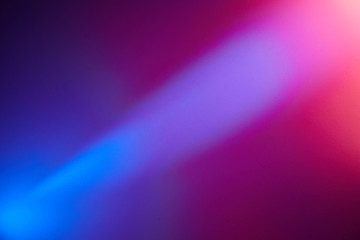 Light blue ray of light on a dark blue dark pink and pink background