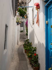 Narrow steps in ancient neighborhood of Anafiotika in Athens by the Acropolis