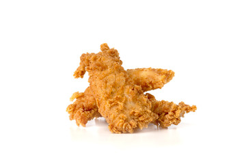Fried chicken fillets on a white background. Fried chicken nuggets close-up.
