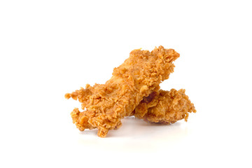 Fried chicken fillets on a white background. Fried chicken nuggets close-up.