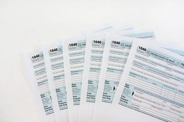 Fototapeta premium tax forms 1040 isolated on white background